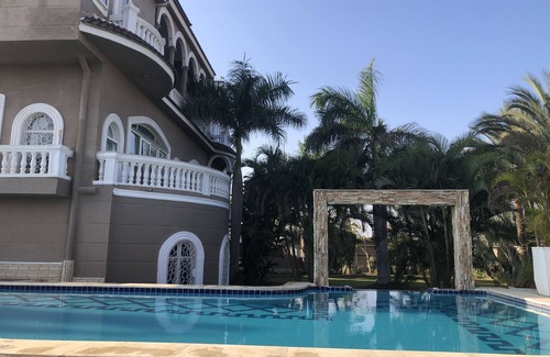 Al-'Amriyah Condo | Private resort type condo setting with full access to garden and pool