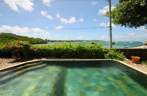 Trou d'Eau Douce Villa | Private waterfront villa, swimming pool, garden, housekeeper, free wifi