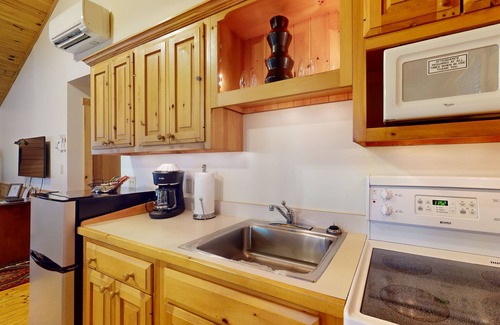 Northport Cabin | Quaint dog-friendly cabin getaway with firepit, AC, kitchen, & hiking