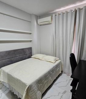 Cremacao House | Quarto no apartamento do Edifício Ilha de Maui