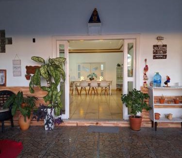 Alvorada House | Quarto triplo com banheiro compartilhado