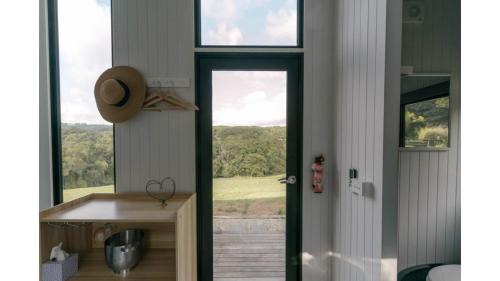 Kuranda House | Rainforest Sunsets by Tiny Away