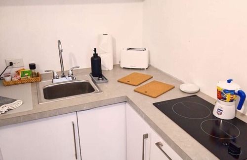 Maleza Baja Apartment | Ramey Base: 2 Mins-Airport/Beach/Golf/Restaurants