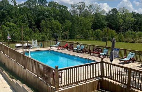 Gunter Afs House | Ranch-Style Oasis: Private CozyXscape with Pool & Fire Pits sleeps 10