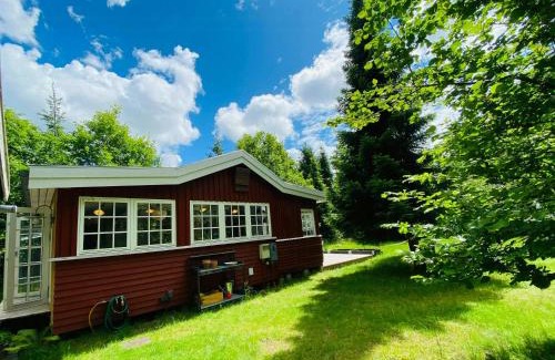 Ramlose House | Red Wood House Within Frederiksværk's Nature