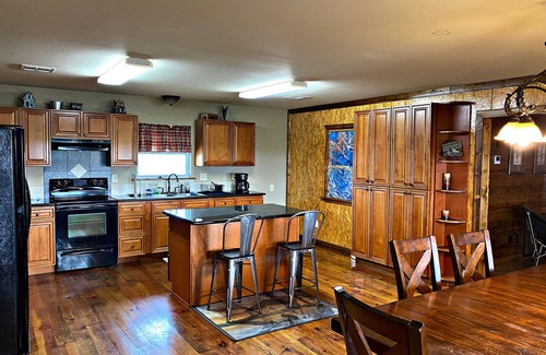 Hopedale House | Reel'em In Lodge - Reel Fisherman Stay and Play. We Speak Fish!