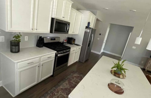 Fuquay-Varina House | Relax and enjoy this beautiful, modern home with a gourmet kitchen!