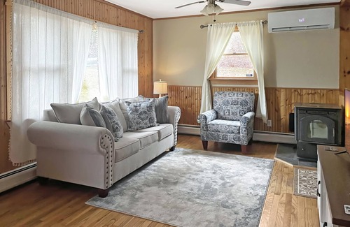 Stamford House | Relax by our scenic brook and enjoy the view of the Green Mountains!