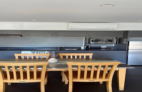 Batehaven Apartment | Relax by the Pool in This Stylish Batehaven Stay