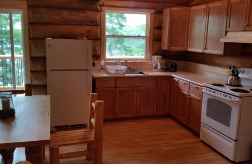 Pleasant River Cottage | Relax in Canada: a lakeside log cottage near Kejimkujik National Park.