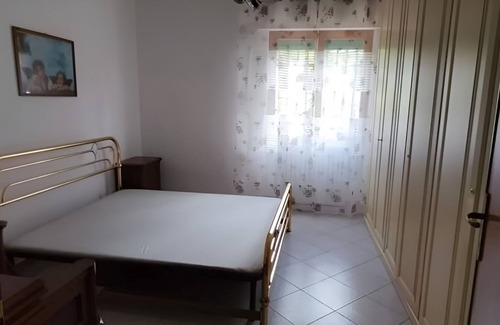 Collemezzano Apartment | Relaxation in the countryside a stone's throw from the sea - Garden, BBQ and private parking