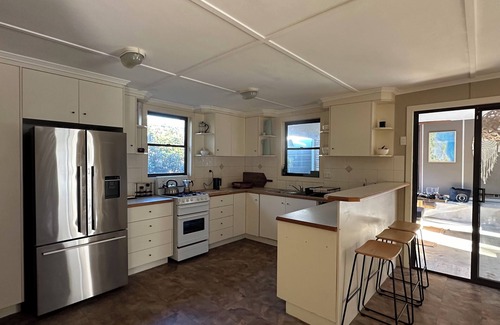 Brisbane Waterfront House | Relaxed Island Retreat - walking distance to the beach!