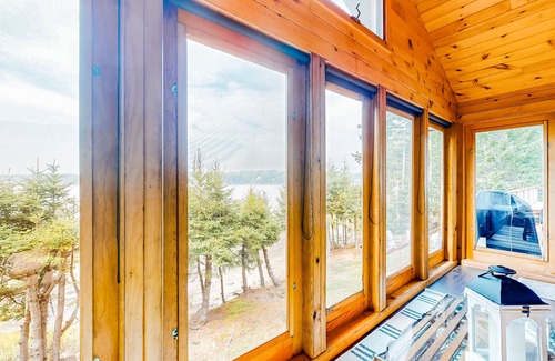 Saint George House | Renovated oceanfront home with stunning view & pebbly beach - snowbird-friendly