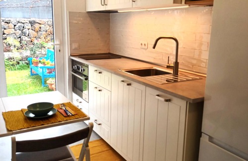 Las Cuevas Apartment | Renovated vacation apartment with garden and Teide view near La Orotava