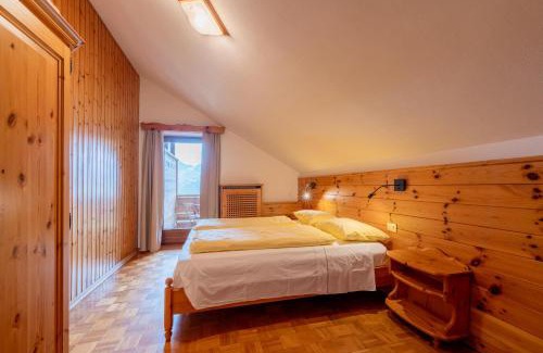 Livinallongo del Col di Lana Cabin | Rifugio Bec de Roces