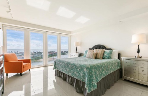 South Padre Island House | Rise & shine in paradise! Stylish Bayview condo beachfront resort shared pools &jacuzzi