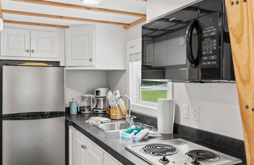 Sylva House | River Run, Riverfront Tiny Home, Trails, and Views