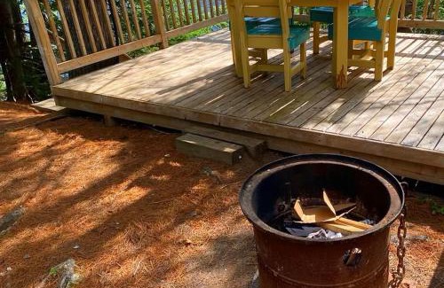Durham Bridge House | Riverfront Rustic Cottage