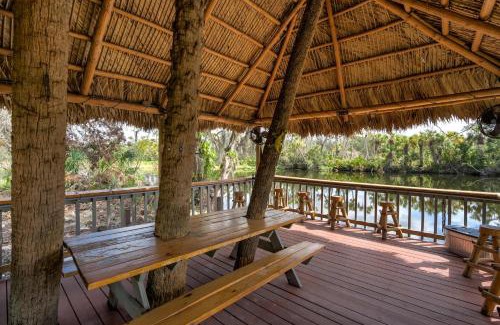 Braden River House | Riverside Oasis Home w Tiki Hut & Firepit