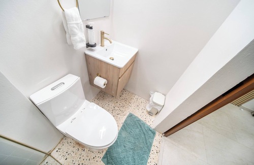 Santurce Hotel | Room 2: Stylish Escape by Calle Cerra Art
