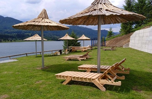 Colibita Apartment | Room at lake Colibita with an incredible view over the lake with Jacuzzi.