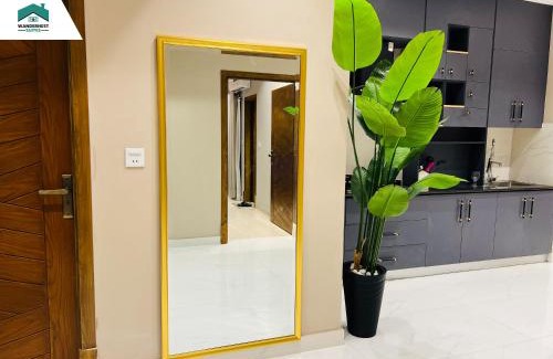 Bahria Town Apartment | Ruby - Chic & Luxury WanderNest Suite at B3 Heights with Gym in Bahria Town Ph-8