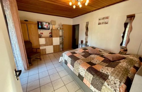 Westerstede Apartment | Ruheoase im Grünen - Komfortable Ferienwohnung am Wulfskamp, Westerstede