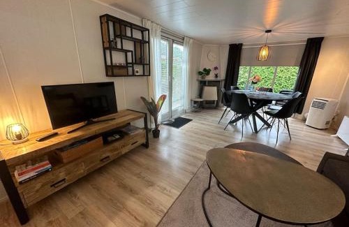 Baarle-Nassau Ski Chalet | Ruim, mooi en modern huisje met een heerlijke tuin