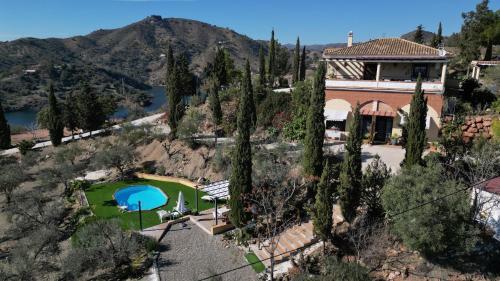 Campanillas House | rural loft with pool views peaceful place near the center