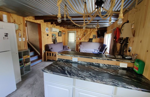 Ventura House | Rustic and charming two-bedroom home a block from the lake and park!