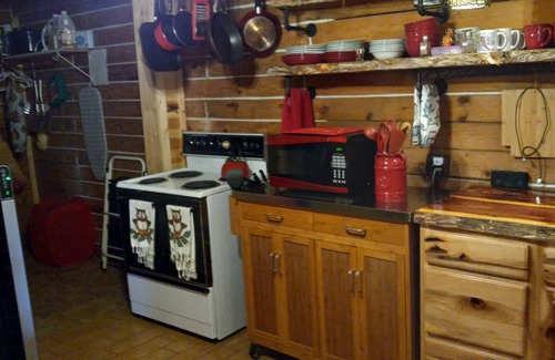 Mountainburg Cabin | Rustic log cabin in the woods with great sunset views