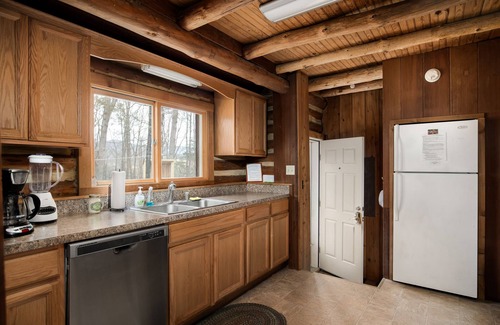 Front Royal Cabin | Rustic Mountain Log Cabin Perched on a cliff side above the Shenandoah River