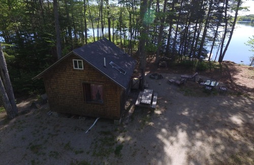 Franklin Cabin | Rustic off grid experience lakefront with beautiful sunrise view of Schoodic Mtn