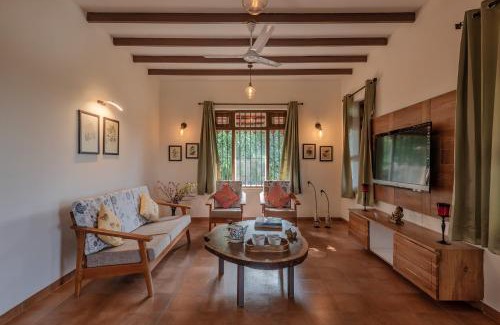 Ambavna Villa | SaffronStays Niramay, Torna-Rajgad - rustic pool villa with a gazebo and great forest views