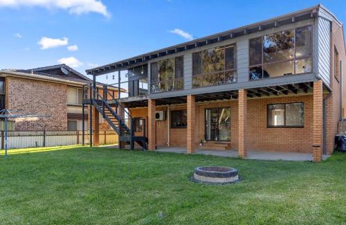 San Remo House | San Remo Charm with Waterfront Views and Sunroom