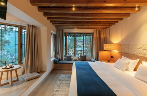 Qiandongnan Hotel | Sanchunli Meng Resort Hotel