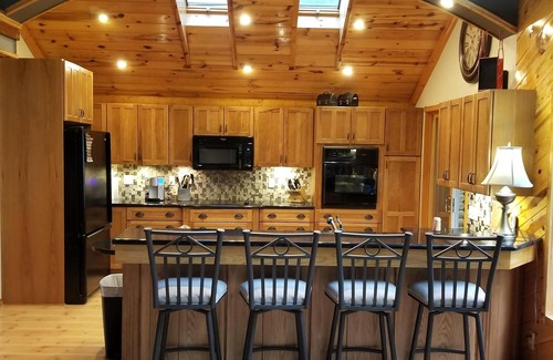 Alexandria House | Sand beach on Lake Mary. No cleaning fees. Pontoon available for rent.