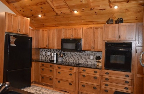 Alexandria House | Sand beach on Lake Mary. No cleaning fees. Pontoon available for rent.