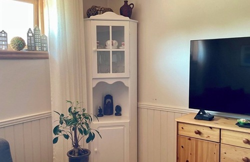 Sandve Apartment | Sandve, spacious apartment, in quiet neighborhood. Sea view.