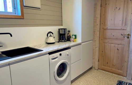Sandve Apartment | Sandve, spacious apartment, in quiet neighborhood. Sea view.