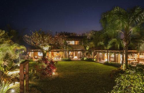 Praia do Rosa House | Santi Sabai Ibira - Um Refúgio às Margens da Lagoa