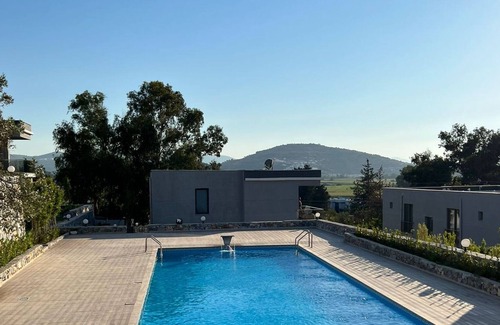 Milas Apartment | Scenic Flat with Shared Pool in Milas