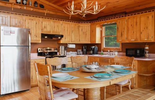 Great Cacapon Cabin | Scenic VIEWS! Pool table - Fire Pit - River Access - Arcade