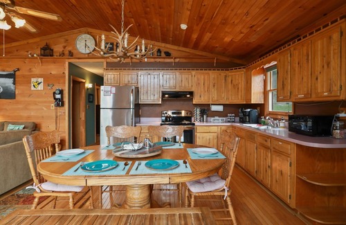 Great Cacapon Cabin | Scenic VIEWS! Pool table - Fire Pit - River Access - Arcade