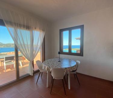 Capo Coda Cavallo Apartment | Seagarden Home vista mare con giardino privato