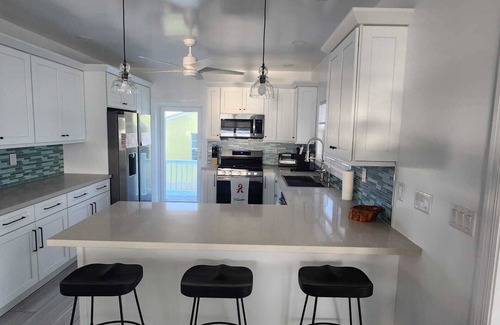 Treasure Cay House | Seaside Bliss: Dockside Living with Stunning Sunsets and Sunrises