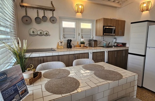 Descalabrado House | Seaside Serenity – Oceanfront Villa with Infinity Pool & Garden Sanctuary