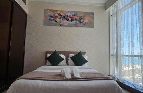 Manama Apartment | Seaview 10th floor 75 inch Smart TV