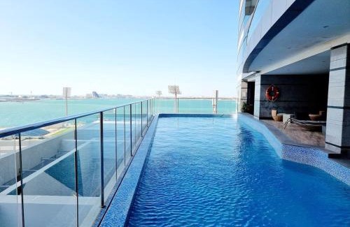 Manama Apartment | Seaview Grey 1Bedroom 75 inch SmartTV