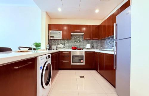 Manama Apartment | Seaview Grey 1Bedroom 75 inch SmartTV